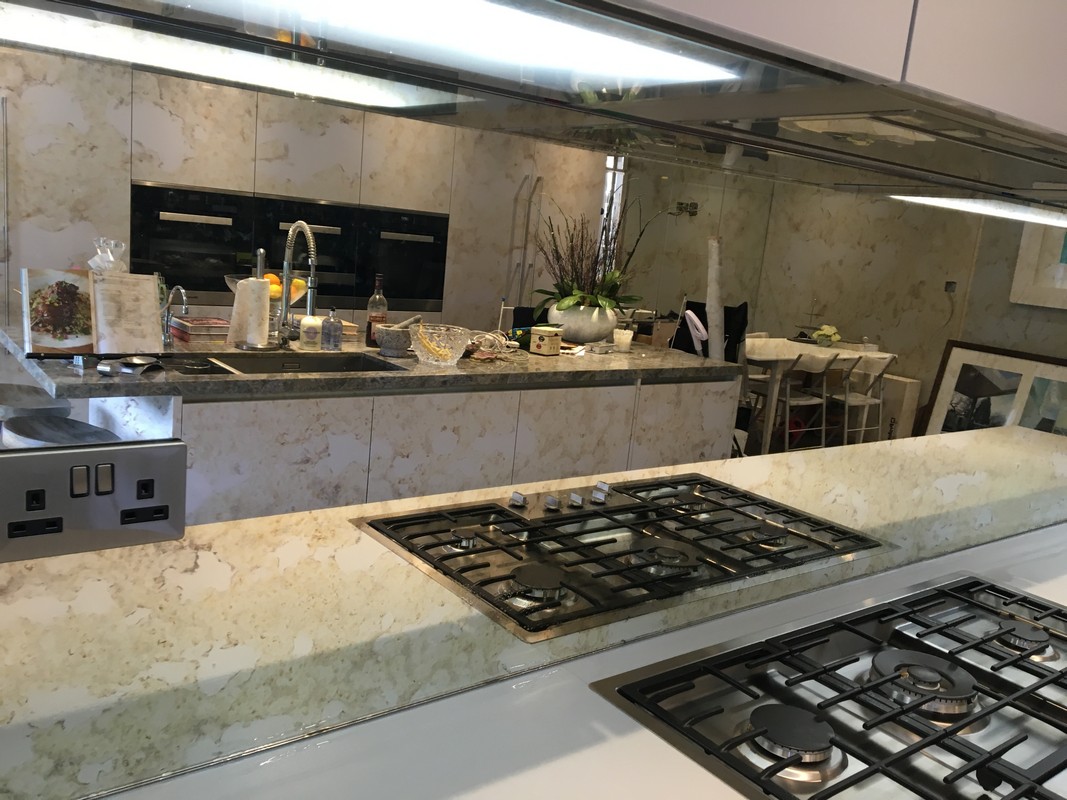 Mirror glass splashback in Mitcham luxury kitchen