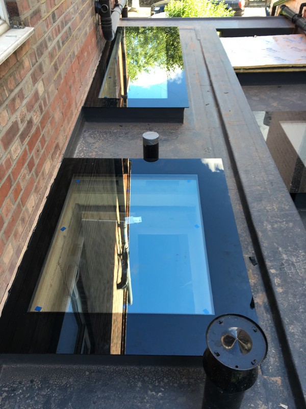 Multiple flat roof skylights on extension in Mitcham